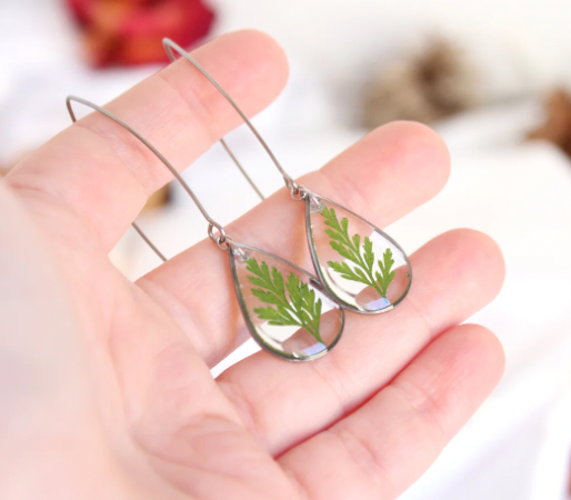 Evergreen earrings encapsulated leaves