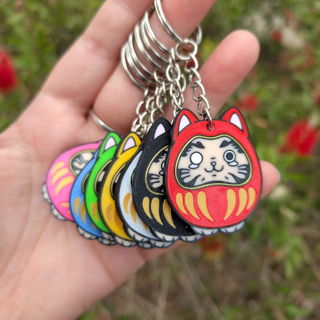 Llaveros Daruma gatos de colores